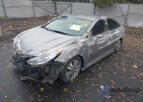 2013 Hyundai Sonata Hybrid Limited z USA, uszkodzony, nr VIN KMHEC4A41DA100187